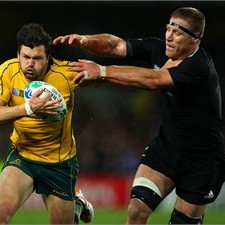 Brad Thorn (R) gets to grips with Wallaby full back Adam Ashley-Cooper