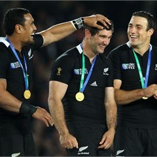 Jerome Kaino ruffles Stephen Donald's hair at the medal presentation