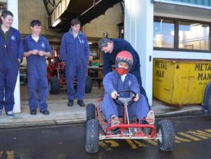 Simon takes the go-kart for a spin.