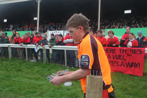 2011 Contest Champion Will Grayling completes a fencing challenge under the watchful eyes of thousands of supporters at the 2011 Grand Final.  