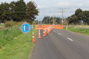 The chicanes that encourage the vehicles to use the State Highway.