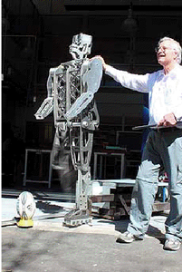Dr Rory Flemmer with his goal-kicking robot. 