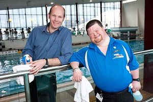 Long-serving employee Richard Bruce (right) with the manager at Freyberg Pool