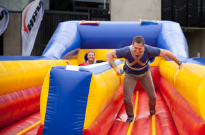 Marc Ellis challenges BLACKCAP Martin Guptill on a horizontal bungee at HRV Sponsorship Day.