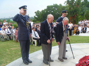 Wreath laying at Kranji War Cemetery in Singapore to mark the 70th anniversary of the fall of Singapore (left to right Group Captain Tim Walshe, NZ Defence attach&#233;, Ted West, Bill Mitchell, Group Captain Darryn Webb (obscured).