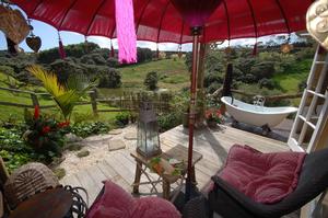 Bath on the deck at the Freshwater Farm Cottages.