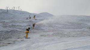 Snow guns crank into action at Queenstown's Coronet Peak ski area.