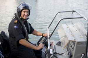 Chief Petty Officer Seaman Combat Specialist Toby Mills preparing to join the Royal Guard of Honour for the Queen's Jubilee Thames River Pageant.
