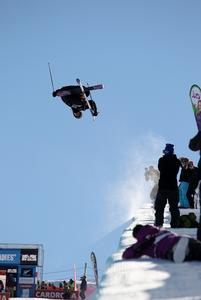 Torin Yater-Wallace gaining big air in Cardrona's superpipe at the FIS Freestyle Ski World Cup.