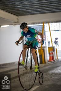 60 year old Peter McLeod rides his penny farthing up the first ramp in Saturdays Urology Associates Movember Car Park Cannon Ball 