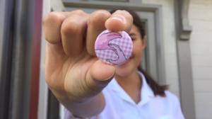Int Women's Day badge designed by Yr 12 student Hilary Royds