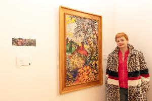 Kathryn McCully, manager of Ara's Art and Design department, with Christchurch Houses, her artistic response to Phliip Trusttum's 1973 piece of the same name.