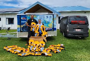 Safety Ambassador Dane Karapu and local kuia Ellen Hardiman of Whangaruru's Tuparehuia Marae Committee with the lifejackets the marae will hold for use by local and visiting boaties.
