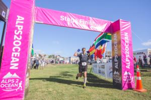 Englishman Keith Burrows crosses the Anchor Milk Otago Alps 2 Ocean Ultra finish line in Oamaru, the quickest to complete the event, winning the men's supported event in 35 hours and 18 minutes. 