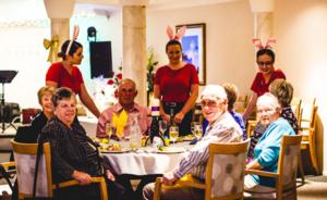 Flight attending students from Toi Ohomai Institute of Technology mingle with residents from the Ocean Shores retirement village