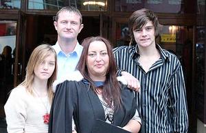 Michaela Gallear with her family, husband Simon and children Megan and Jack. Her parents in Turkey watched live as she graduated last week through Massey's Graduation Live initiative.  