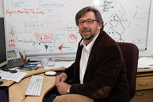 Distinguished Professor Gaven Martin prepares to teach maths at Summer School, starting this November.