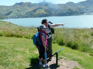 Maddie Harrison of Tai Tapu School looks out over Quail Island with Communications and Engagement  Advisor for DOC, Sarah Mankelow 