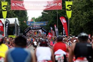 Cyclists take on the legendary Solarar Berg, lined with over 35,000 spectators at Challenge Roth 2012