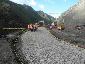 Temporary road to carry one lane of traffic.
