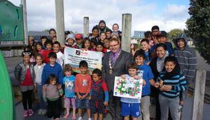 Mayor Wallace with the children attending the Kids on Foot school holiday programme at Petone Central School.
