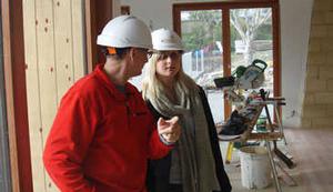 Advice that pays: Eco design advisor Sarah Fleet checks on prgress of a home.