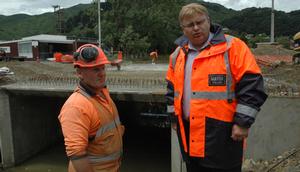 Lower Hutt Mayor Ray Wallace inspects the new storm water protection works in Fitzherbert Road, Wainuiomata, with site supervisor Lyall Patton of Riverside Construction.