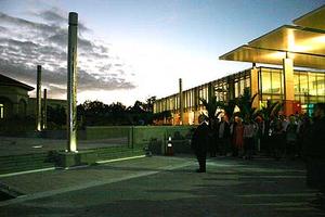 Staff, students and supporters gather at dawn to bless the pou and Student Central building.