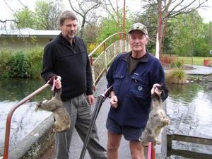 Miniature Train Society member and MDC officer Stephen Simonek and Greater Wellington pest control officer Murry Clark after September's possum cull at Masterton's Queen Elizabeth Park.