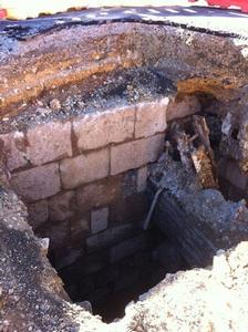 The excavated mine shaft