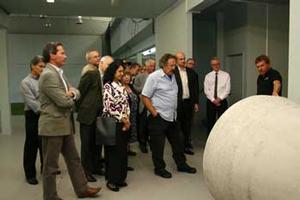 Trevor Logan shows stakeholders around the new research  and development facility in Albany.