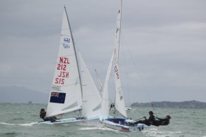 NZL Sailing Team's two 470 teams cross in close quarters on Sunday, racing at Sail Auckland 2012. Paul Snow Hansen and Jason Saunders are just ahead of Jo Aleh and Olivia Powrie.