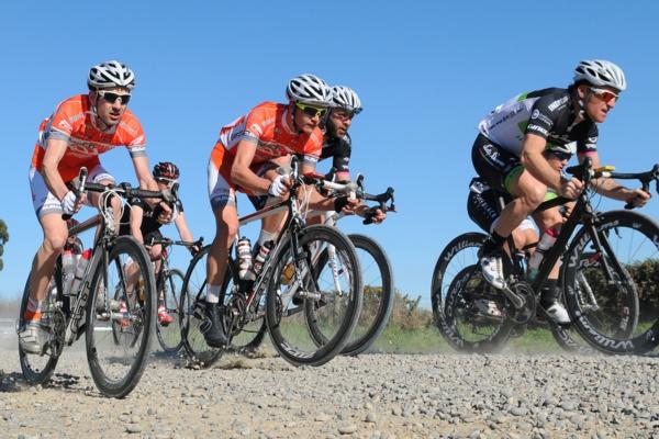 Anthony Chapman (left), Will Bowman, Jason Allen and Gordon McCauley fight for position on the gravel in the Benchmark Homes Hell of the South in 2012. 