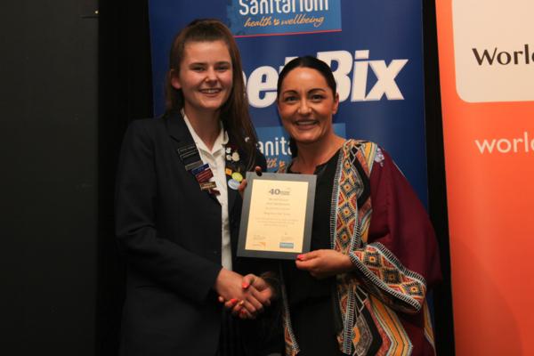 Flossie van der Pol (Year 12) receiving her scholarship