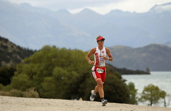 Belinda Granger of Australia runs around Lake Wanaka during the Challenge Wanaka on January 15, 2011 in Wanaka, New Zealand