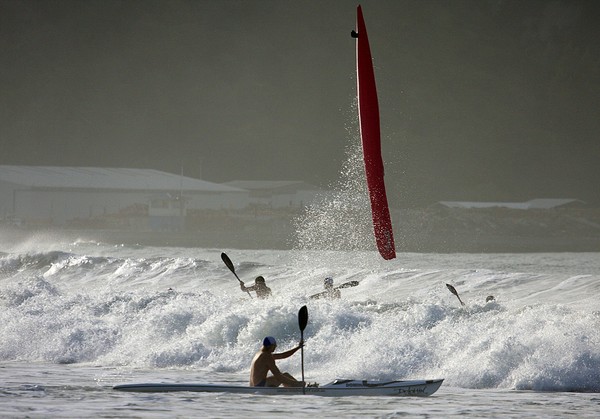 Big swells made for a dramatic first day at the New Zealand surf lifesaving championships in Gisborne today.