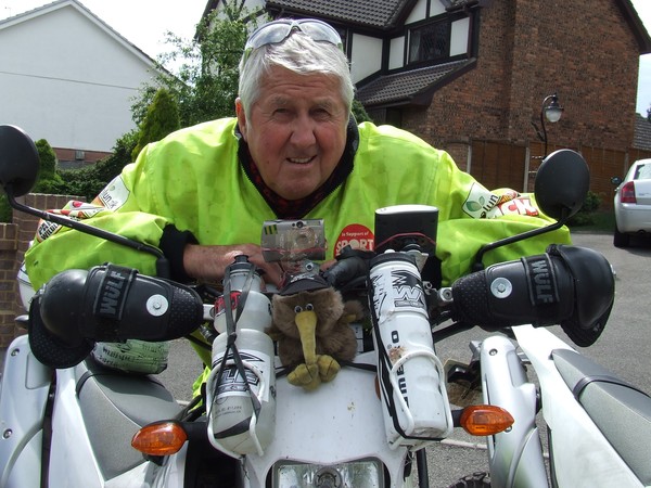 Barry Briggs with his KIWI mascot 'CLARKIE' (alias All Black Don Clarke) braved tough conditions on their 6000 miles Charity Ride together