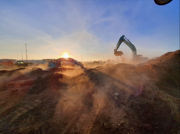 Connell Contractors digger excavates during a frosty morning