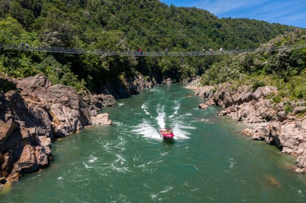 Buller Swingbridge and Jetboat Print Res, taken by Oliver Weber, credit www.nelsontasman.nz