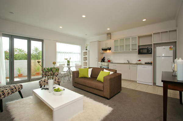 View of the living room and kitchen.