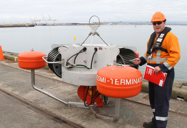 Oil responder Bruce Goff with the Terminator oil skimmer ready for deployment.
