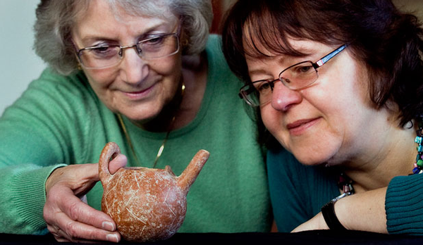AUCKLAND BOUND: Heather Mansell, left, and Dr Gina Salapata inspect an ancient Cypriot clay pot found in a Palmerston North garage sale.