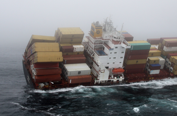 The Rena in rough seas surrounded by fog.