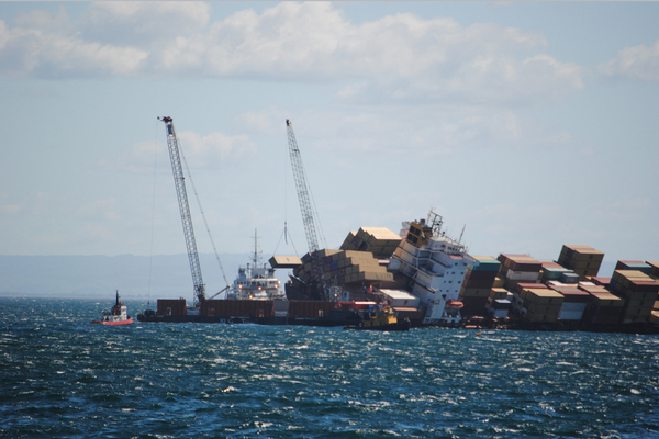 The first container being lifted off the Rena this afternoon