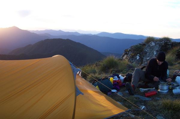 An Outward Bound student on their solo at sunrise.  