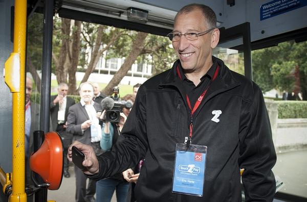  2degrees CEO Eric Hertz pays for his bus ride with his Touch2Pay smartphone.