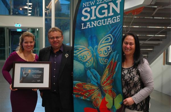 Mayor Ray Wallace at Saturday's award ceremony with Deaf Aotearoa community relations officer Shannon Morris (left) and service coordinator Karen Pointon.