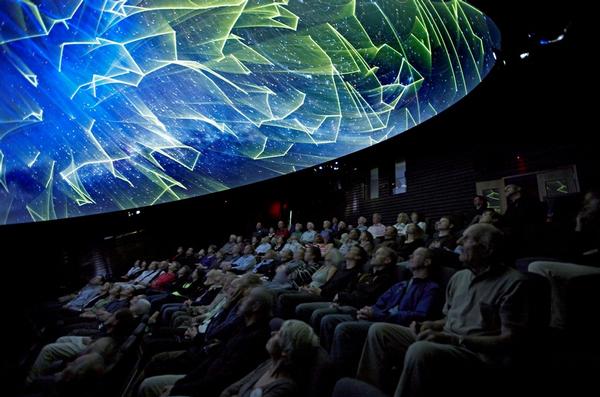 Guests enjoying the experience at the Sir Edmund Hilary Alpine Centre theatre at Aoraki Mount Cook.