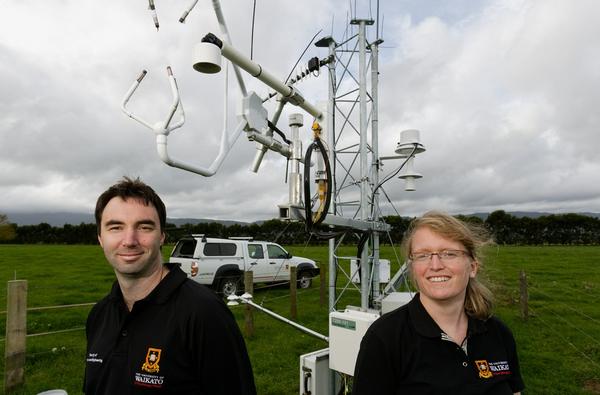 GETTING THE MEASURE: University of Waikato technician Aaron Wall and research fellow Dr Susanna Rutledge measure data at a Waharoa dairy farm.