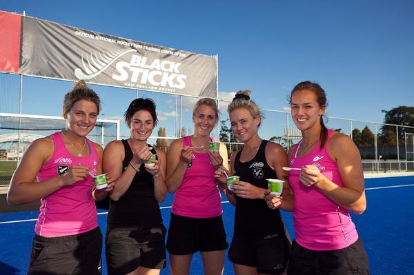 NZ Womens Black Sticks enjoy Symbio after training.